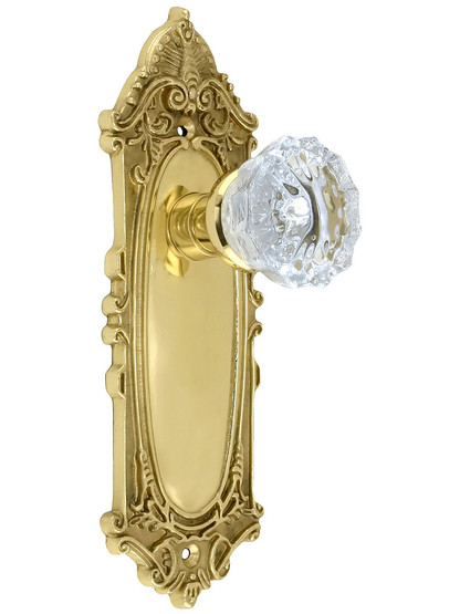 Largo Design Door Set With Fluted Crystal Glass Door Knobs in Unlacquered Brass.
